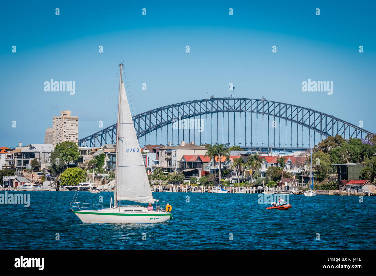 sail boat in front of sydney harbour bridge Stock Photo Alamy