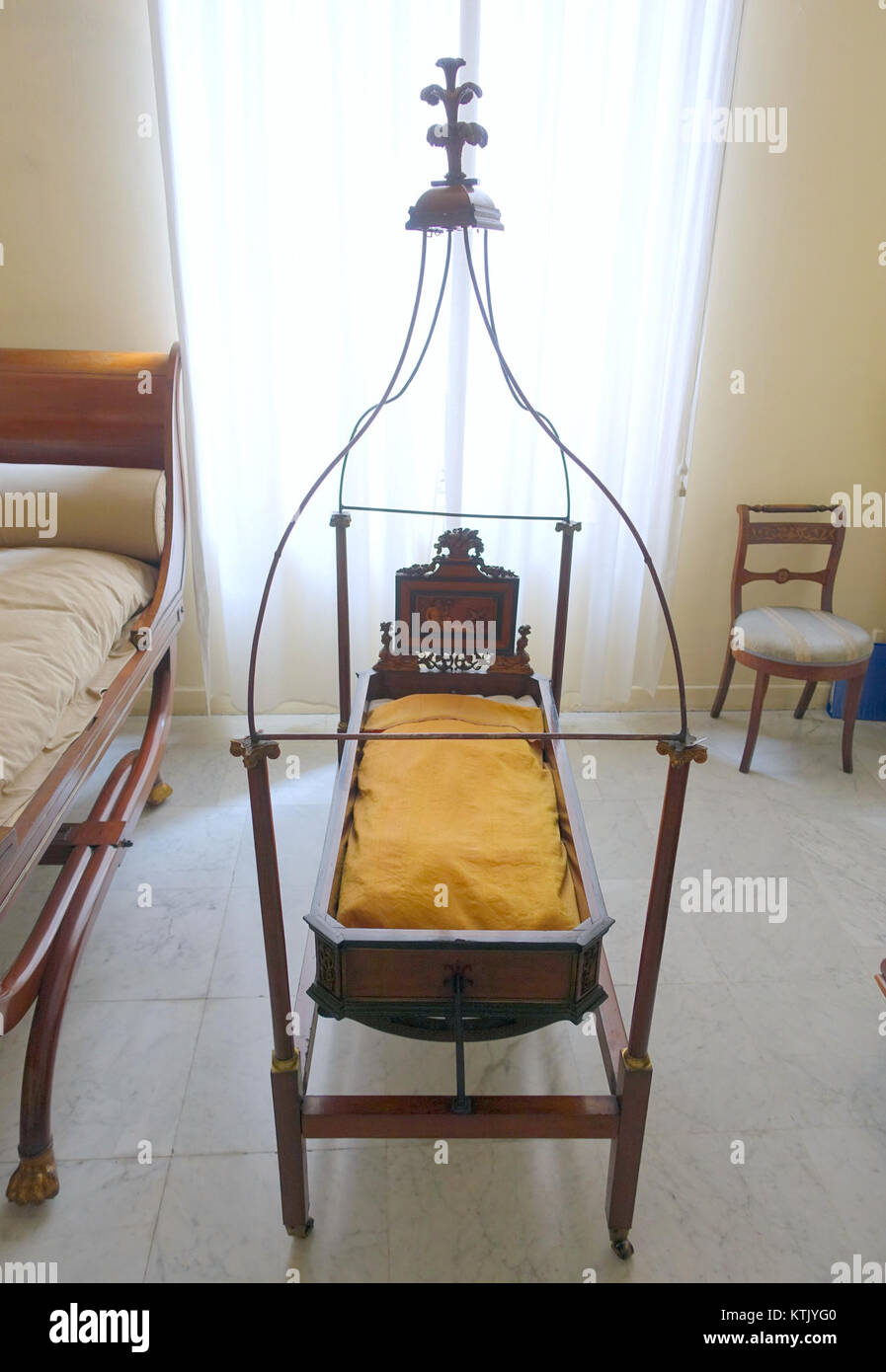Baby cot, Catalonia, c. 1820 AD, mahogany, gilded brass Museo Nacional