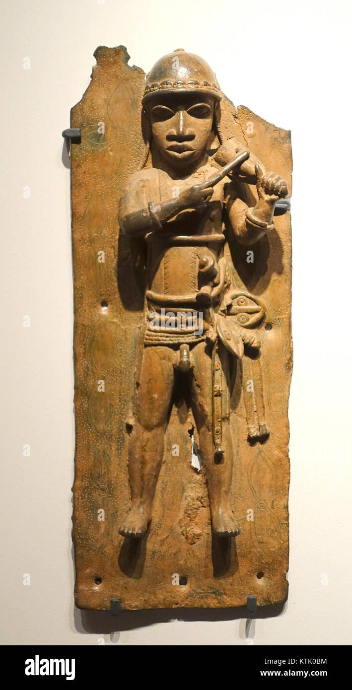 The Benin plaque in the Ethnological Museum in Berlin is a significant artifact from the Benin Kingdom, located in present-day Nigeria. The plaque is part of a group of Benin Bronzes, known for their intricate metalwork and historical importance. The artifacts were looted during the British punitive expedition of 1897 and remain valuable pieces of African art and history in European museums. Stock Photo