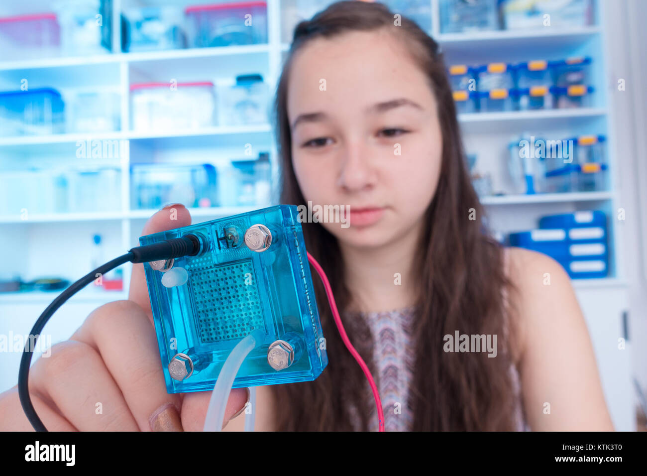 schoolgirl is experimenting with a hydrogen fuel cell Stock Photo Alamy