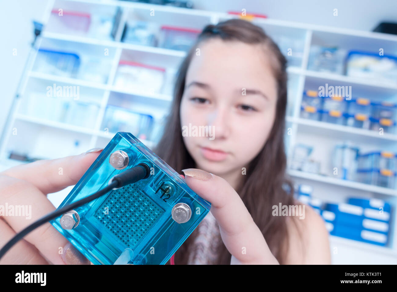 schoolgirl is experimenting with a hydrogen fuel cell Stock Photo Alamy