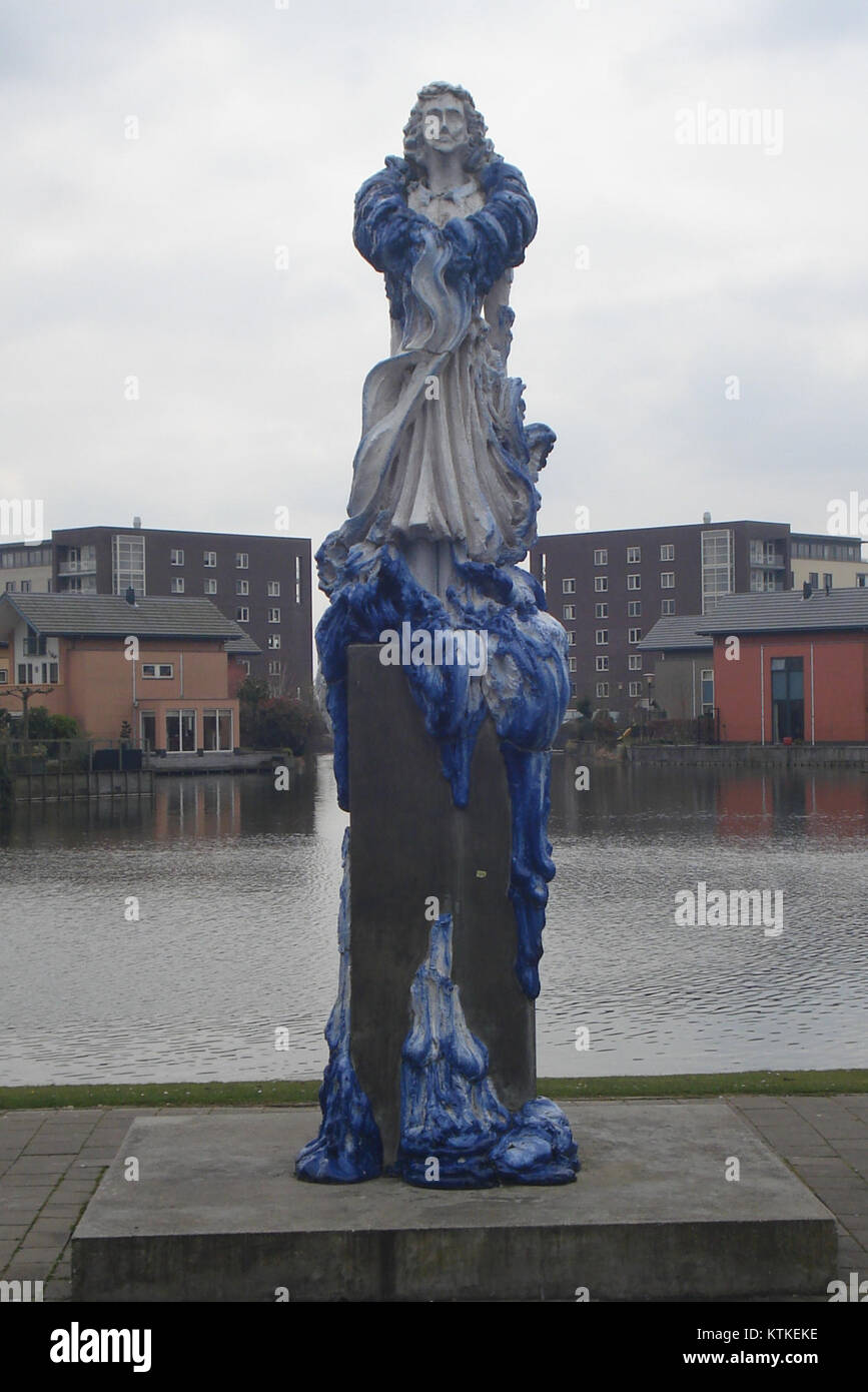 This artwork in Barendrecht, Netherlands, explores the relationship between art and landscape. The installation reflects the integration of artistic expression within the natural environment. Stock Photo