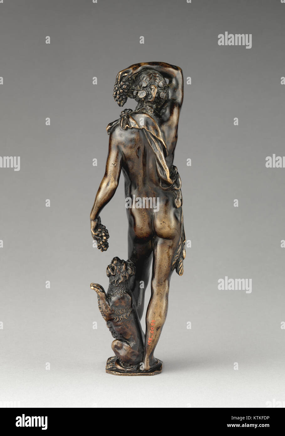 A work of art featuring Bacchus, the Roman god of wine, accompanied by ...