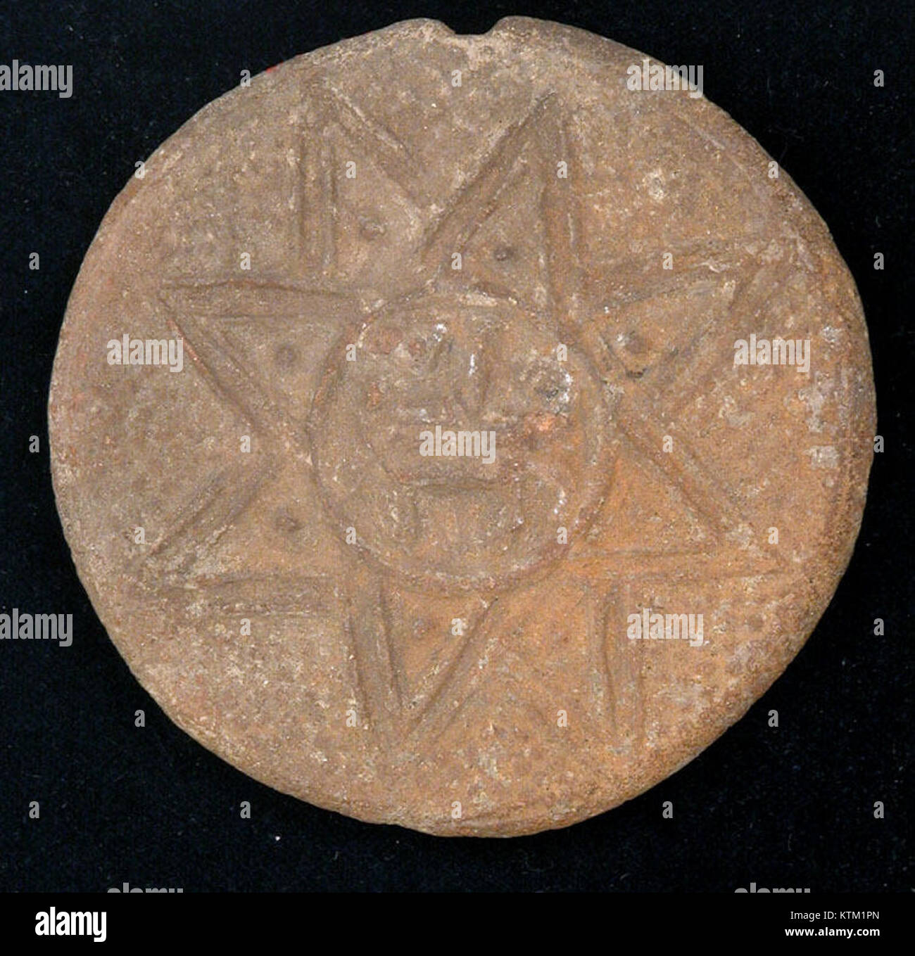 A historical object in the form of a Bath Scraper, part of the ...