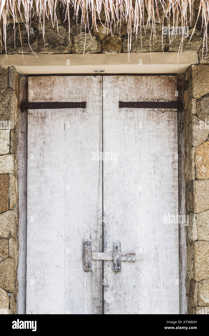 Wooden Textured White Door With Latch Rustic Interior In Bali