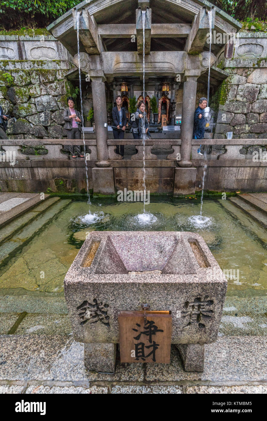 Kyoto, Japan November 11, 2017 Tourists drinking water from Otowa