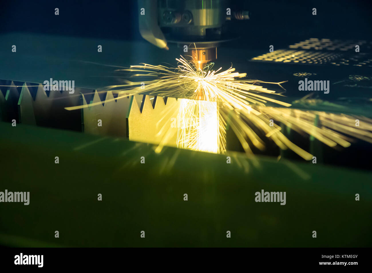 laser cutting metal plate ; sparks light Stock Photo Alamy