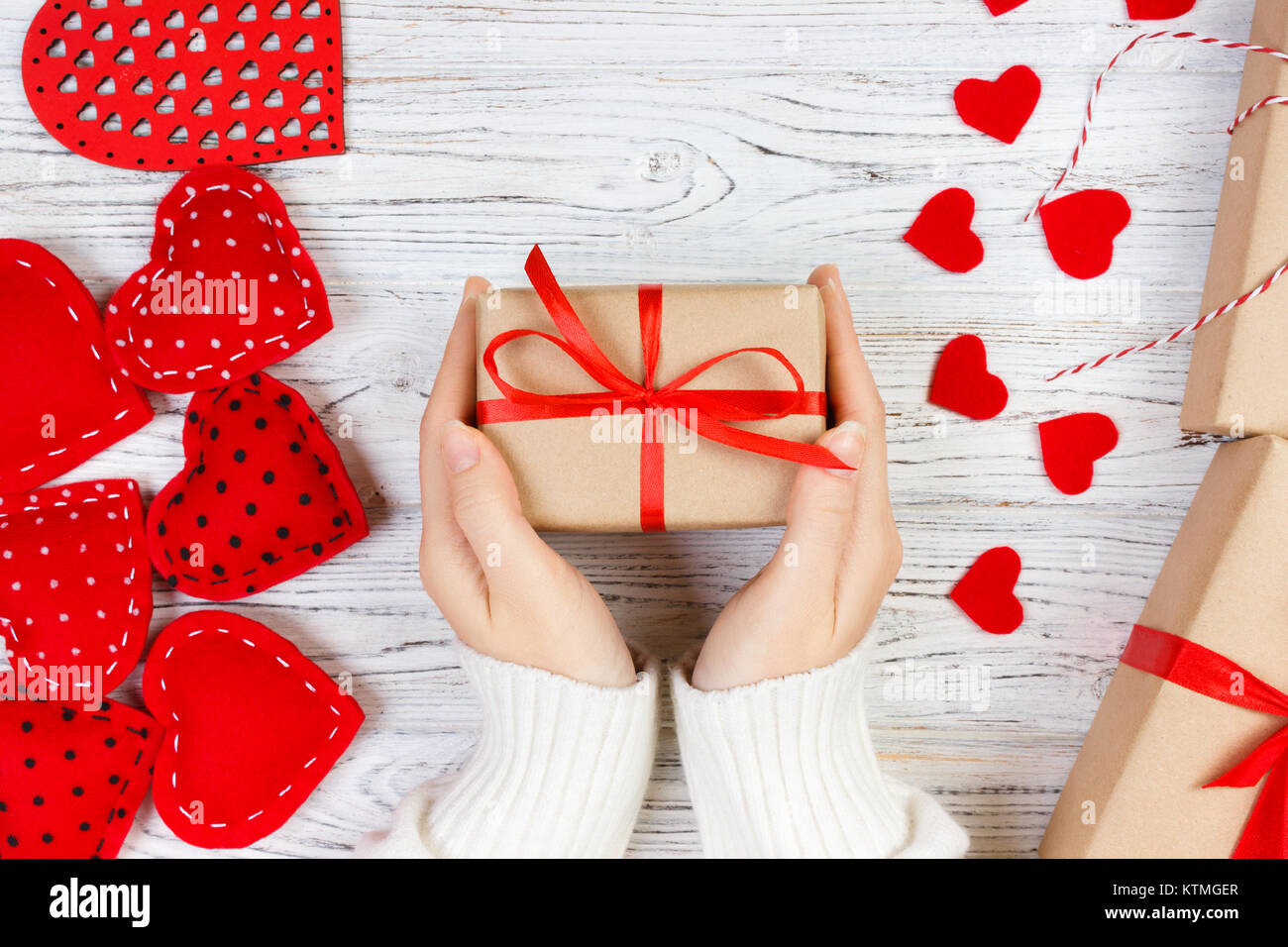 Valentines Day Background Girl Hand Give Valentine Gift Box With A Red Heart Inside On A White Old Wooden Table Valentine Day Stock Photo Alamy