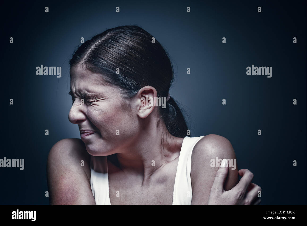 sad woman crying, looking aside on black background, closeup portrait,  profile view Stock Photo - Alamy