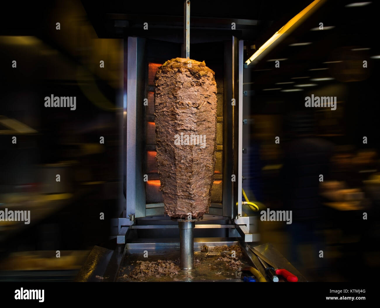 traditional turkish food doner kebab in a street food shop on blur background Stock Photo