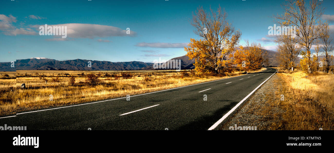 The autumn road image captures the beauty of a rural road during the ...