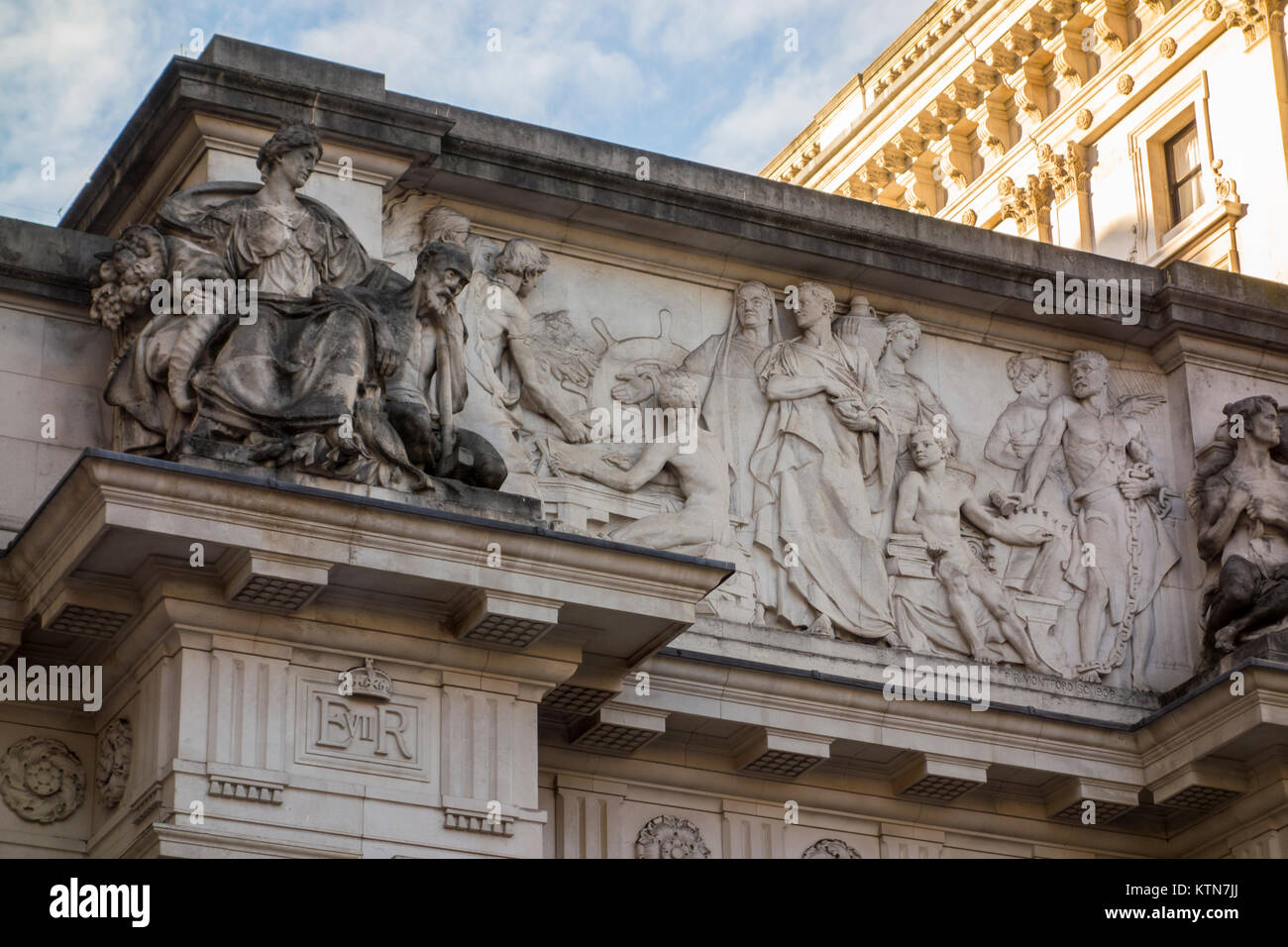 Arch over King Charles Street by architect J. M. Brydon with sculptors Paul Raphael Montford &  William Silver Frith viewed from Whitehall, London, UK Stock Photo