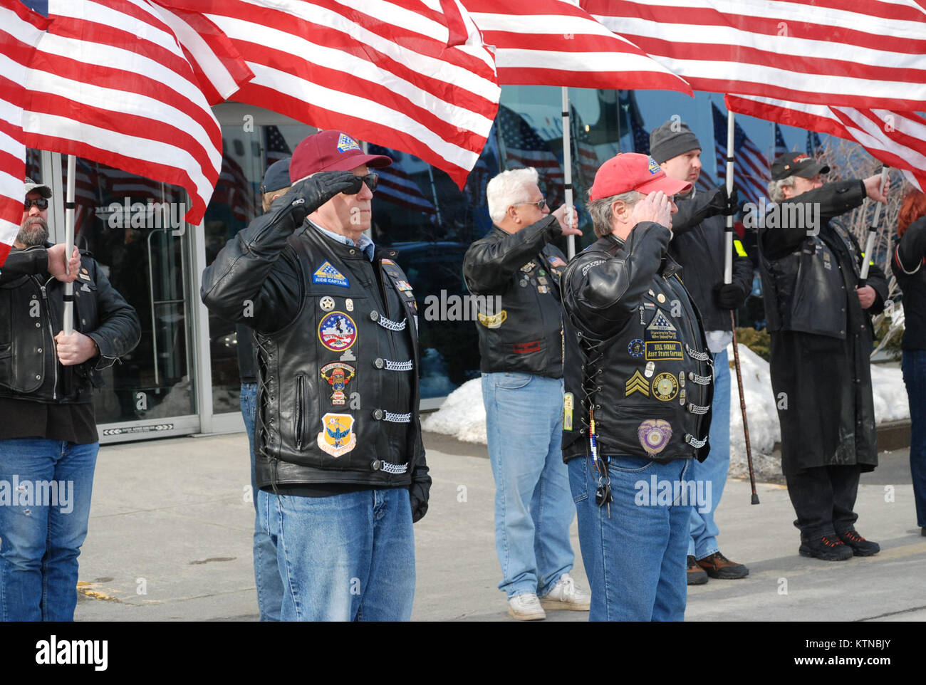 ALBANY, N.Y. – Members of the Capital Region Patriot Guard Riders render honors during the homecoming of New York Army National Guard Soldiers Jan. 8 at Albany International Airport.  Some 200 Soldiers arrived in two flights across the state from the 427th Brigade Support Battalion’s Headquarters Company and Company B following demobilization at Camp Shelby, Miss.  The Soldiers served in Kuwait or Afghanistan as part of the 27th Infantry Brigade Combat Team’s overseas service in 2012.  Patriot Guard Riders have been an enduring presence for military events and ceremonies across the region. U.S Stock Photo