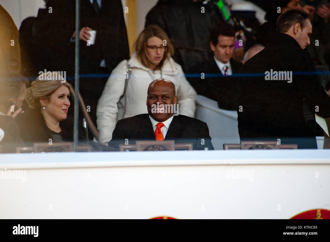 WASHINGTON, D.C. — – Craig Robinson waits for President Barack Obama and his sister, First Lady Michelle Obama, to pass the official review stand where they later watched the remainder of the Inauguration parade.  Mr. Robinson is an American college basketball coach and the current head men's basketball coach at Oregon State University. The 57th Presidential Inauguration was held in Washington D.C. on Monday, January 21, 2013. The Inauguration included the Presidential Swearing-in Ceremony, Inaugural Address, Inaugural Parade and numerous inaugural balls and galas honoring the elected Presiden Stock Photo