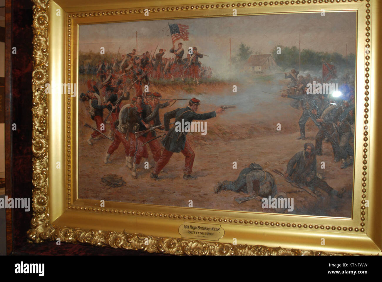 SARATOGA SPRINGS-- This painting depicts members of the 14th Regiment of the New York State Militia engaging members of the Army of Northern Virginia during the first day of the Battle of Gettysburg on 1 July 1863. The painting is among the items in the new Civil War exhibit at the New York State Military Museum which was officially opened on Saturday, July 27. (Eric Durr/ DMNA) Stock Photo