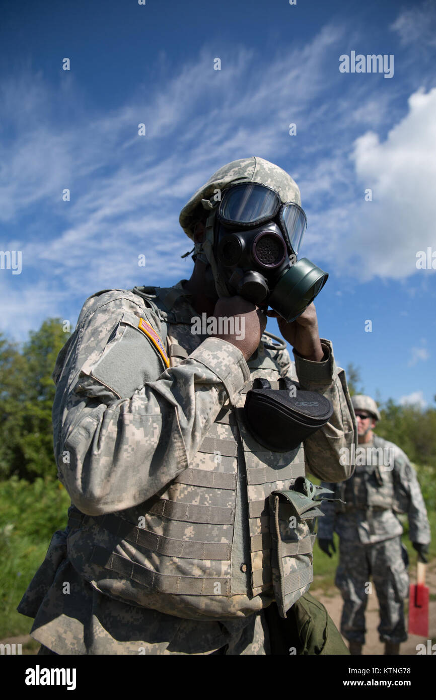 Mobilisation Mask Sgt. Christopher C. Smalls II, a combat medic with HHC 42nd Combat ...