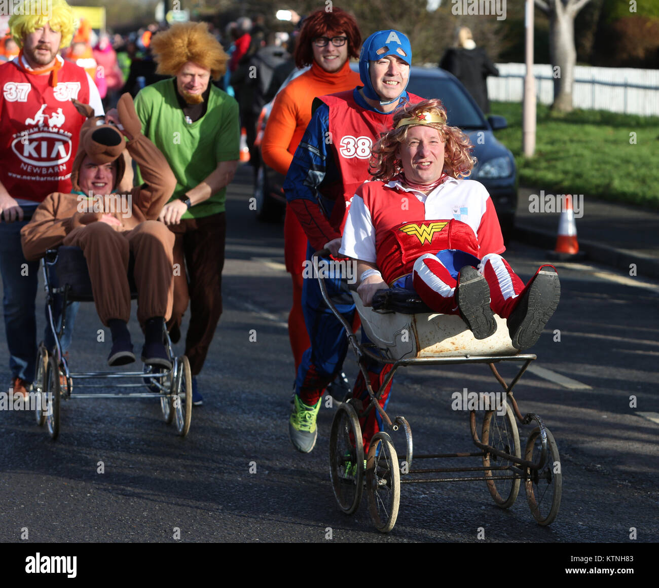 Pagham, UK. 26th Dec, 2017. Pagham, near Chichester, West Sussex, UK. The 2017 annual Pagham Pram Race. Pictured is action from the fun packed Boxing Day event. Tuesday 26th December 2017 Credit: Sam Stephenson/Alamy Live News Stock Photo