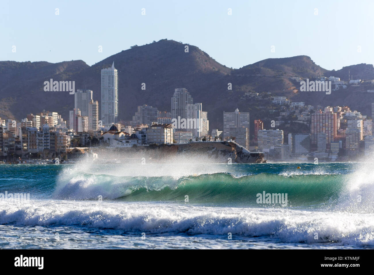 Benidorm, Costa Blanca, Spain, 27th December 2017. Storm Bruno sweeps across Spain and out to sea along the Costa Blanca coast. The crests of waves are whipped up and blown backwards as the wind blows. Credit: Mick Flynn/Alamy Live News Stock Photo