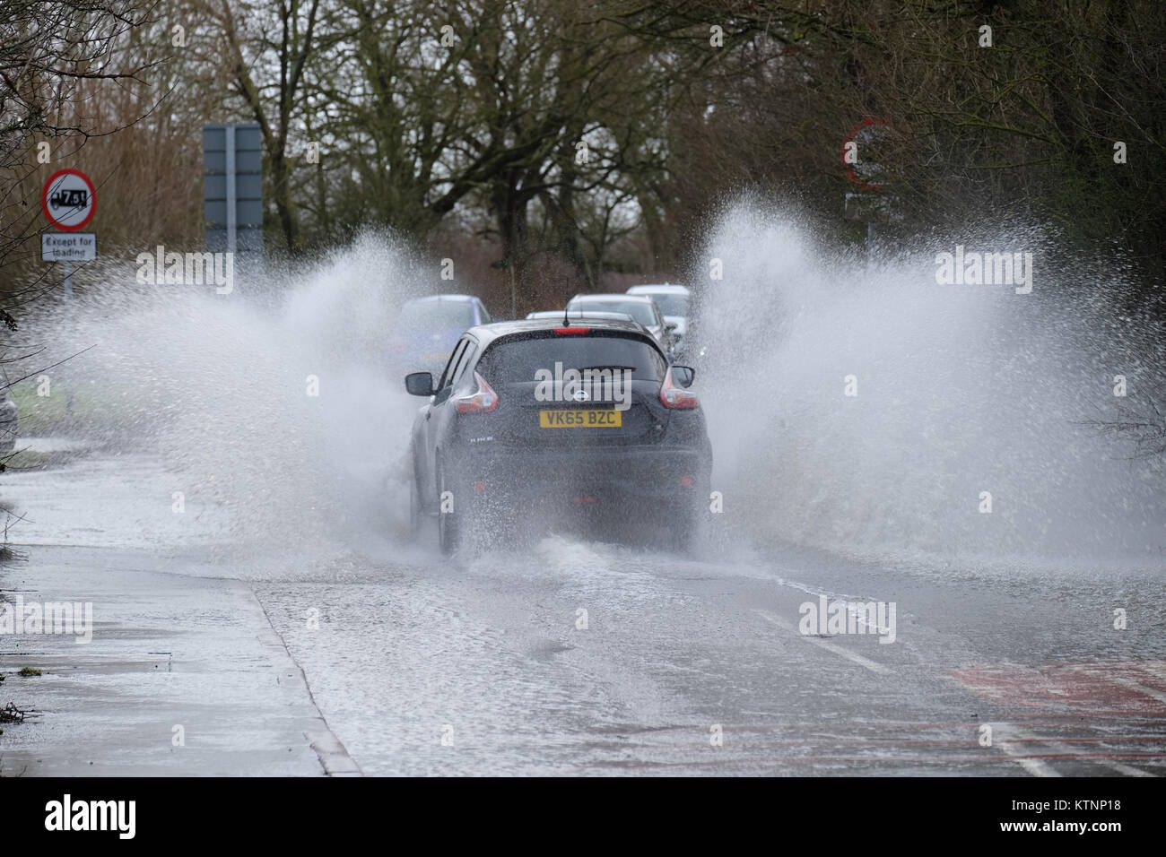 cars drive through flood water on mountsorrel lane Stock Photo Alamy