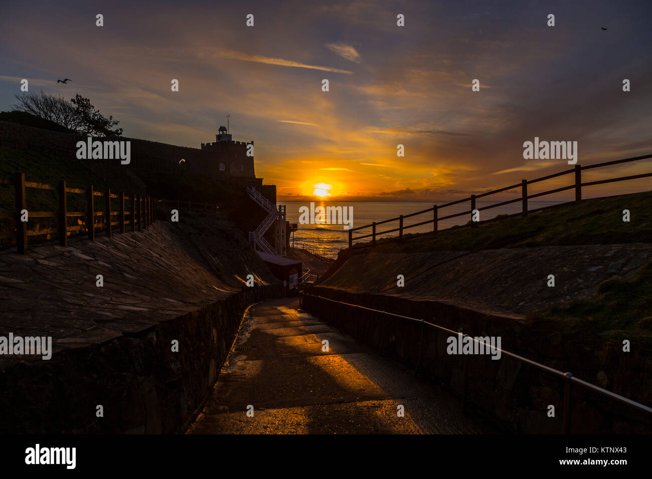 Sidmouth, Devon, 28th Dec 17 Dawn above Jacob's Ladder in  Sidmouth on a clear but freezing cold December morning. Photo Central / Alamy Live News Stock Photo