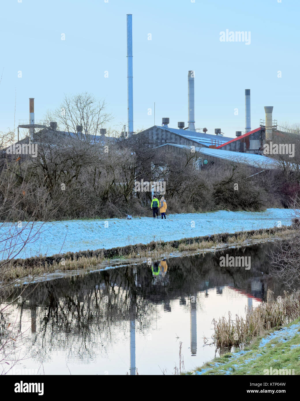 Glasgow, Scotland, UK. 28th Dec, 2017. UK Weather: Frozen towpath on the Forth and Clyde canal sees people walking home on what is expected to be the coldest night of the year. Credit: gerard ferry/Alamy Live News Stock Photo