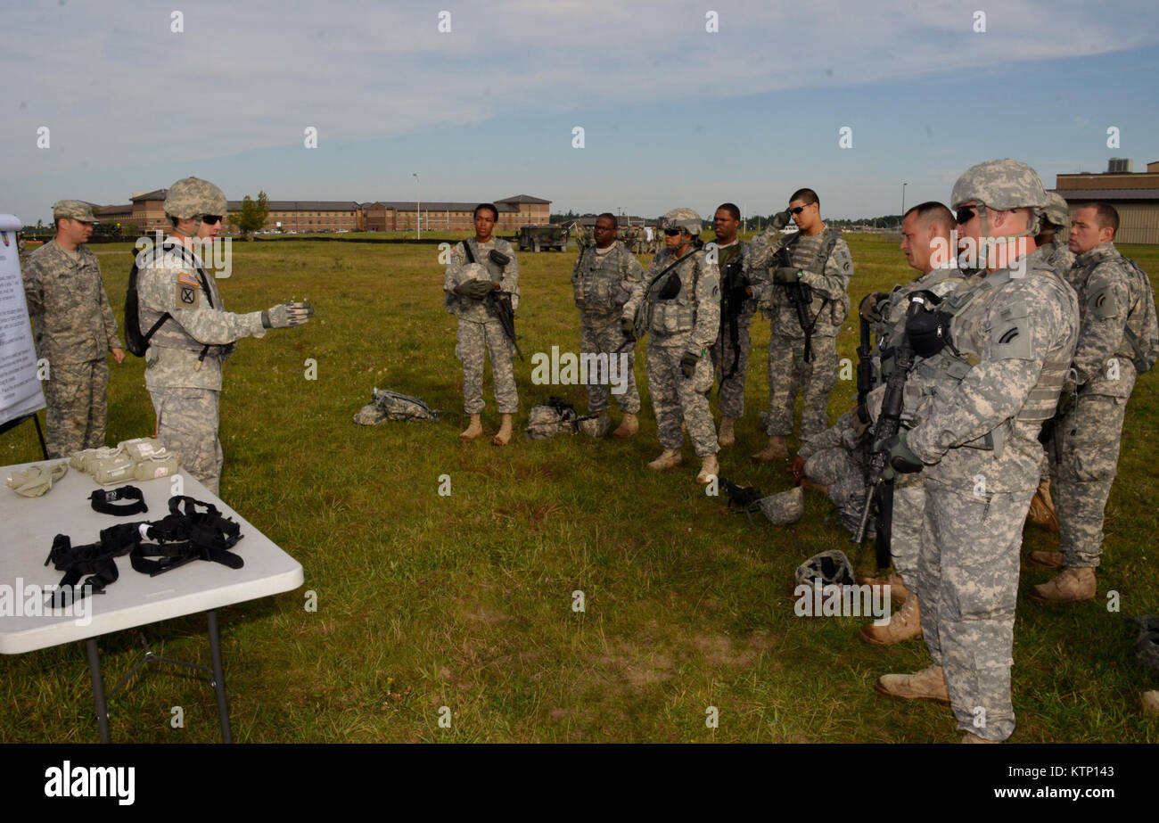 On Aug 18th 2013, Major General Harry E. Miller, Commanding General of the 42d Infantry Division, New York Army National Guard visited Soldiers of the 42nd CAB and 642 ASB during their Pre-Mobilization training being held at Fort Drum. MG Miller visited the soldiers at the various stations such as first aid, Commo, Land Nav and other Warrior Tasks as part of the PMT. MG Miller was also briefed by the Commander of the 3-142 Assault Helicopter Battalion, LTC Jeffrey Baker and his staff on current support operations the Battalion is providing during the PMT as well as future training operations Stock Photo