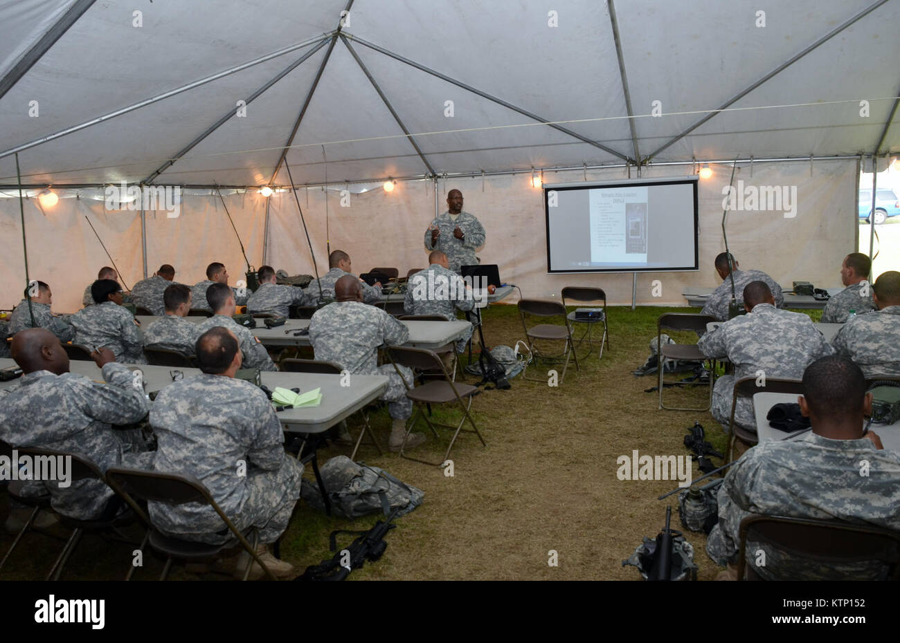 On Aug 18th 2013, Major General Harry E. Miller, Commanding General of the 42d Infantry Division, New York Army National Guard visited Soldiers of the 42nd CAB and 642 ASB during their Pre-Mobilization training being held at Fort Drum. MG Miller visited the soldiers at the various stations such as first aid, Commo, Land Nav and other Warrior Tasks as part of the PMT. MG Miller was also briefed by the Commander of the 3-142 Assault Helicopter Battalion, LTC Jeffrey Baker and his staff on current support operations the Battalion is providing during the PMT as well as future training operations Stock Photo