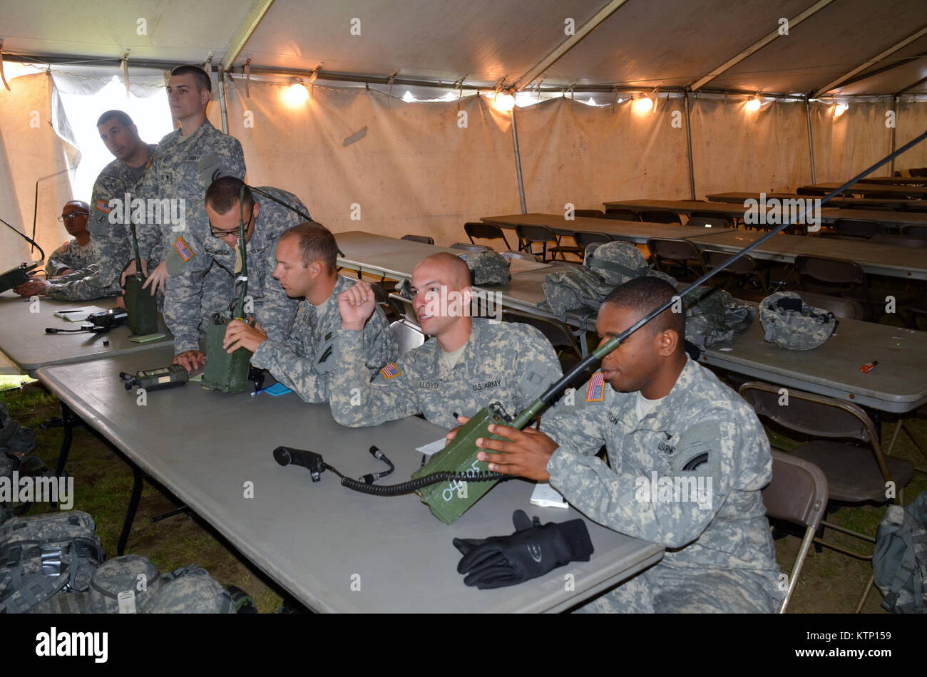 On Aug 18th 2013, Major General Harry E. Miller, Commanding General of the 42d Infantry Division, New York Army National Guard visited Soldiers of the 42nd CAB and 642 ASB during their Pre-Mobilization training being held at Fort Drum. MG Miller visited the soldiers at the various stations such as first aid, Commo, Land Nav and other Warrior Tasks as part of the PMT. MG Miller was also briefed by the Commander of the 3-142 Assault Helicopter Battalion, LTC Jeffrey Baker and his staff on current support operations the Battalion is providing during the PMT as well as future training operations Stock Photo