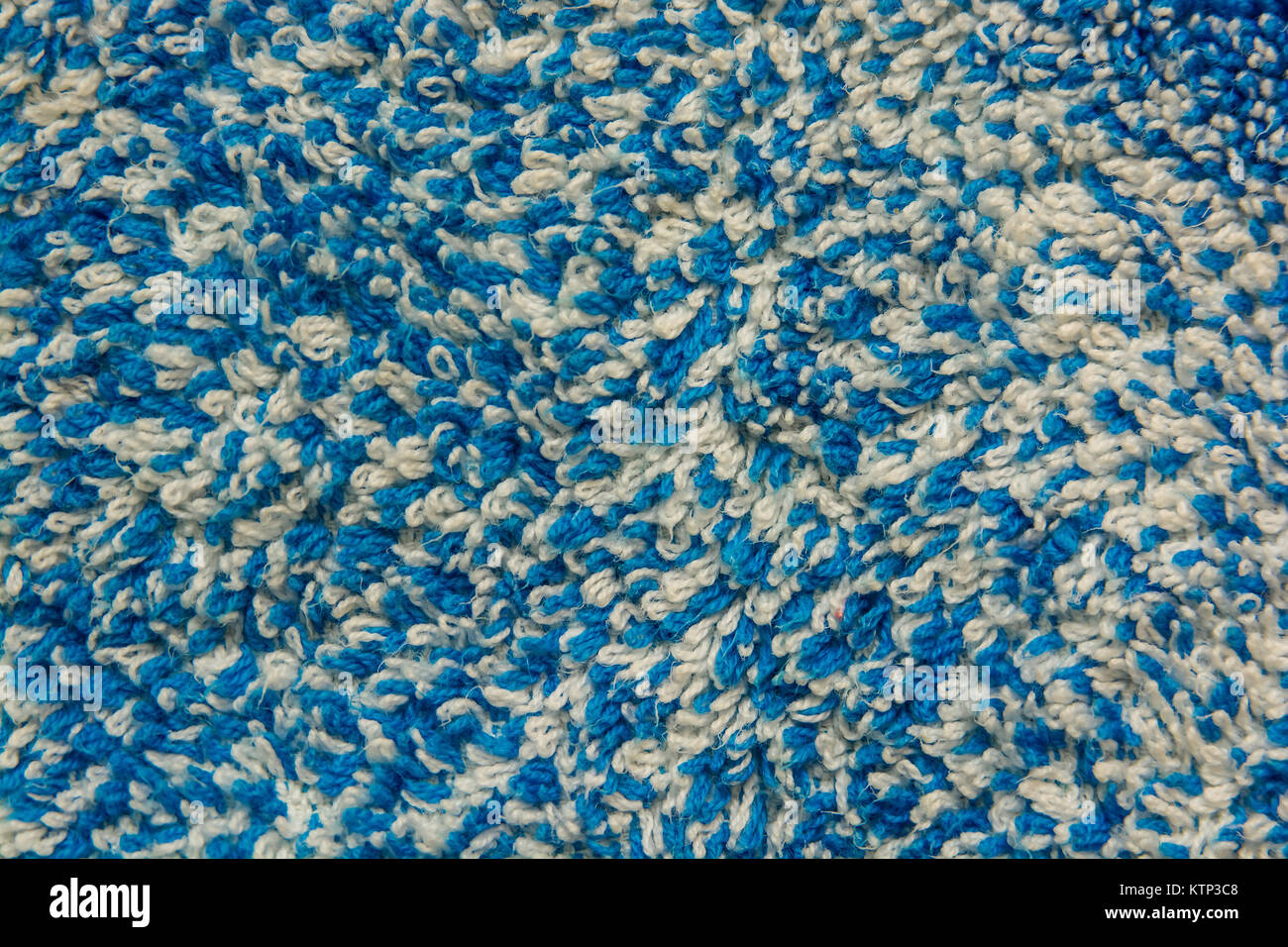Close up of blue and white domestic woolen carpet texture Stock Photo