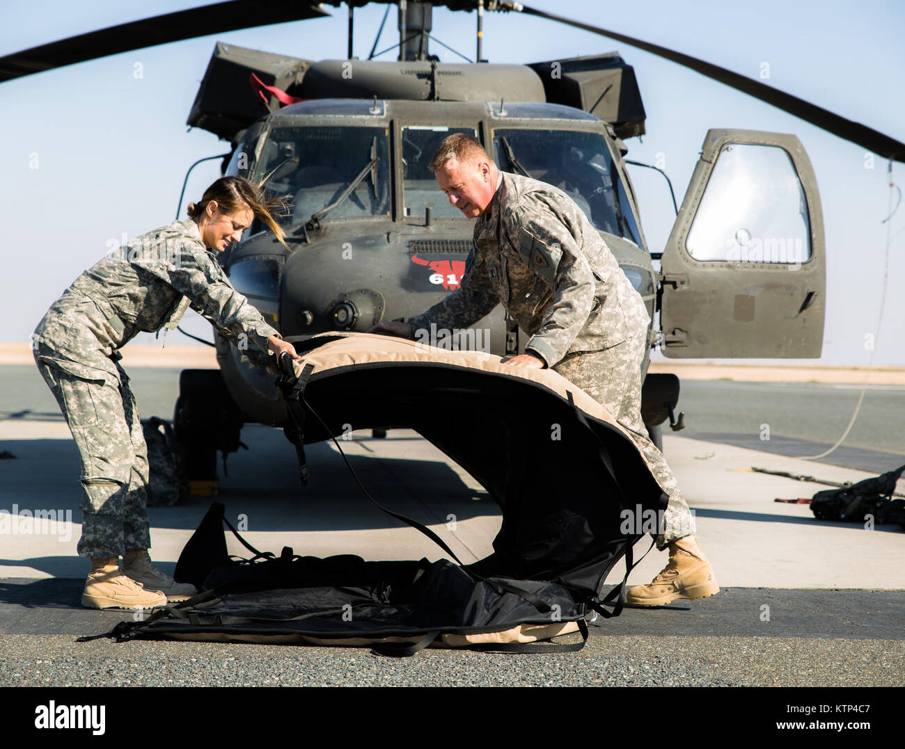 Capt. Mindy Wallace and Chief Warrant Officer Toleman Miller, both from ...