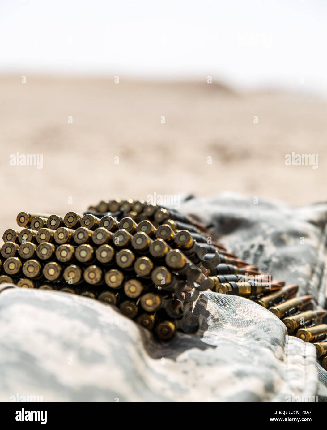 Soldiers from 3rd Battalion, 238th General Support Aviation Battalion (GSAB), and 3rd Battalion, 142nd Assault Helicopter Battalion (AHB), shoot the first phase of aerial gunnery with a 240B machine gun on June 3, 2014, near Camp Buehring, Kuwait.  Once refreshed with the weapon system on the ground the aviators of the battalions will conduct aerial gunnery training and qualifications with their UH-60 Black Hawks later on in the month.  The GSAB and AHB, from the Michigan and New York Army National Guards, respectively, are both deployed to Kuwait under the 42nd Combat Aviation Brigade in supp Stock Photo