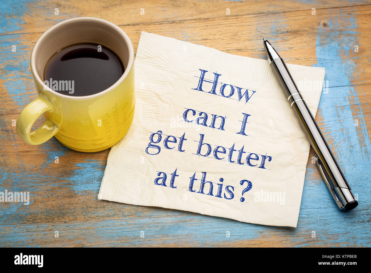 How can I be better at this? Handwriting on a napkin with a cup of espresso coffee Stock Photo