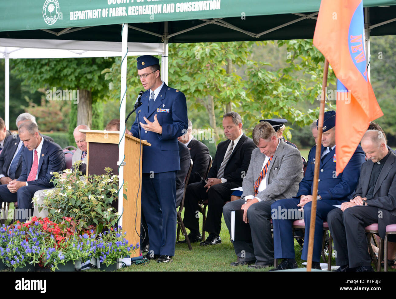 U.S Air Force Maj John L. Torres Jr., chaplain 105 Airlift Wing, New York Air National Guard, leading a prayer of remembrance at the Patriot Day, September 11th Remembrance ceremony held at the Orange County Arboretum, Thomas Bull Memorial Park, Montgomery, New York, Sept. 11, 2014. (U.S. Air Force photo by Tech. Sgt. Michael OHalloran/Released) Stock Photo