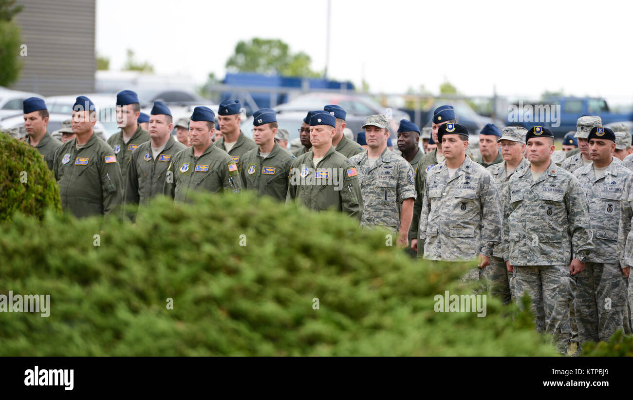 U.S. Air Force Airmen of the 105 Airlift Wing, New York Air National Guard stand at attention during a memorial ceremony held at Stewart Air National Guard Base on the 13th anniversary of the tragic events of 9-11, Sept. 11, 2014. (U.S. Air Force photo by Tech. Sgt. Michael OHalloran/Released) Stock Photo
