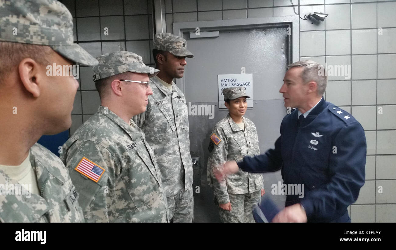 Maj. Gen. Jack Briggs, right, Director of Operations for Headquarters U.S Northern Command, visits with (from left) New York Army National Guard Staff Sgt. Jose Batista of Company A, 101st Expeditionary Signal Battalion, 1st Lt. Mike Tracy of Company G, 427 Brigade Support Battalion, Capt. Odelle Despot, commander of the 719th Transportation Company and Spc. Catarina Bowen of Company B, 101st Signal Battalion. The Soldiers are part of Joint Task Force Empire Shield, a security enhancement force performing state active duty in New York City to augment law enforcement. Some 500 Soldiers and Air Stock Photo