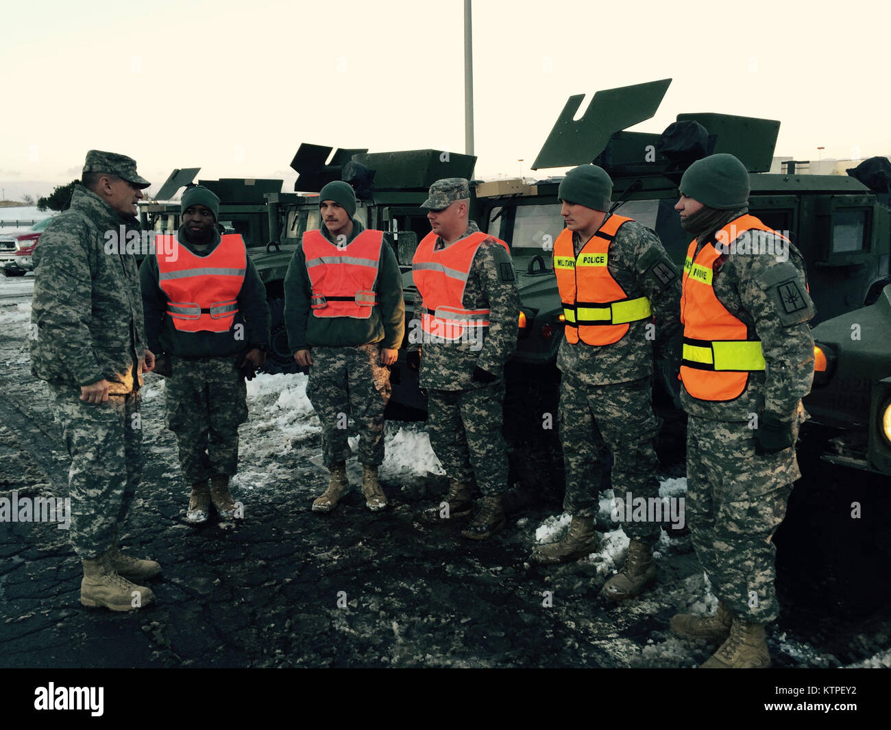 Major General Patrick Murphy, the Adjutant General of New York speaks to Army National Guard Soldiers preparing to go on a traffic control point mission on Friday, Jan. 9, 2015 as the New York National Guard assisted the New York State Thruway Authority in closing portions of the road in Buffalo due to poor weather conditions. (U.S. Army National Guard photo by Major Mark Frank/Released) Stock Photo