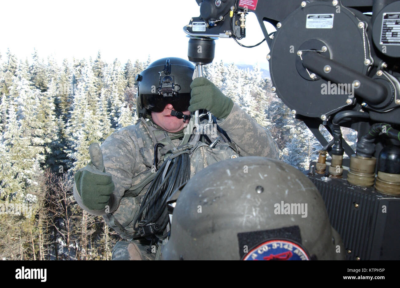 Military helicopter winch crew Stock Photo Alamy