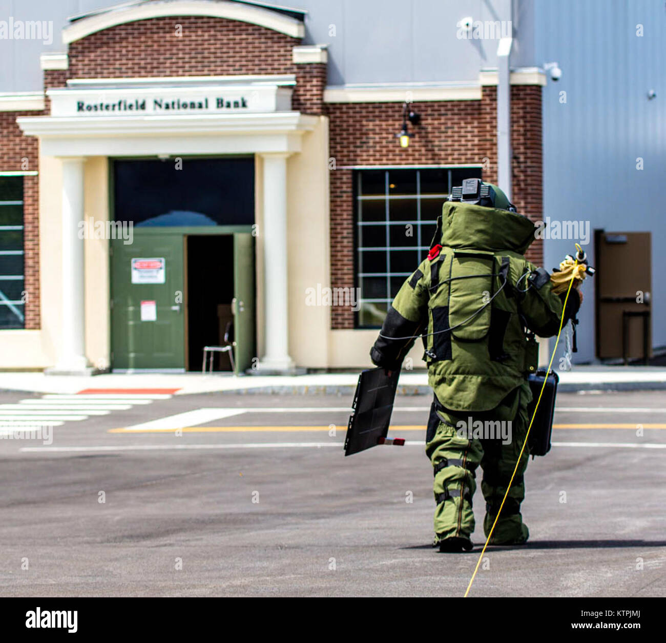 An officer of the Endicott, N.Y. Police Department heads towards a