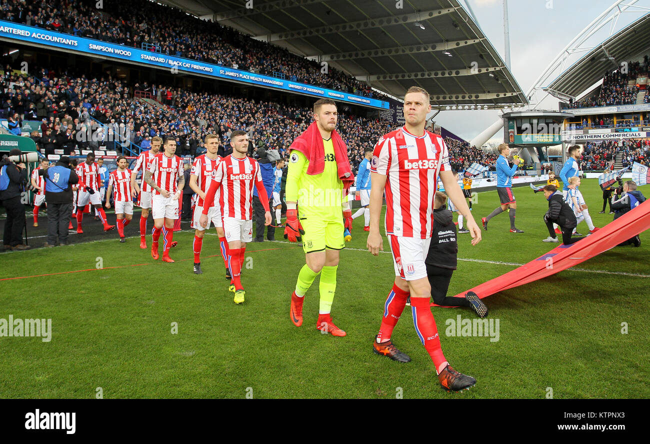 Stoke City walk out for the Premier League match at the John Smith's Stadium, Huddersfield. PRESS ASSOCIATION Photo. Picture date: Tuesday December 26, 2017. See PA story SOCCER Huddersfield. Photo credit should read: Richard Sellers/PA Wire. RESTRICTIONS: No use with unauthorised audio, video, data, fixture lists, club/league logos or 'live' services. Online in-match use limited to 75 images, no video emulation. No use in betting, games or single club/league/player publications. Stock Photo