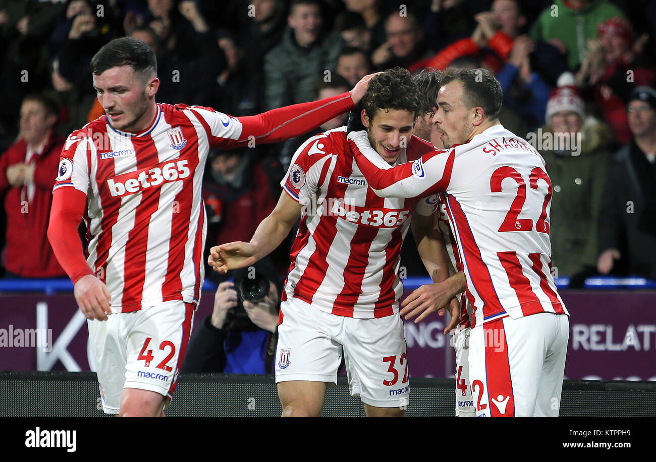 Stoke City's Ramadan Sobhi (centre) celebrates scoring his side's first goal of the game with team-mates during the Premier League match at the John Smith's Stadium, Huddersfield. Stock Photo