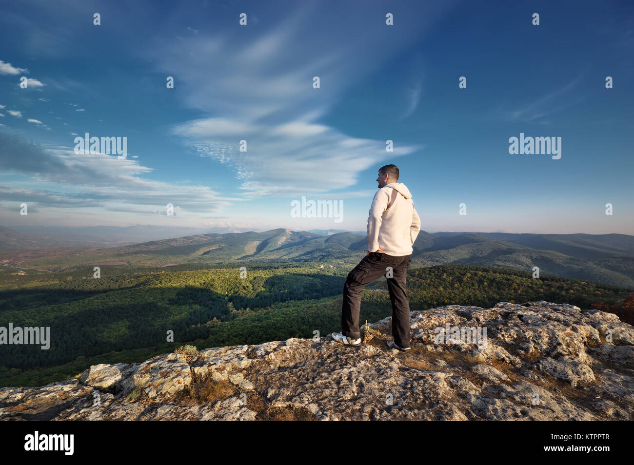 Man at mountain top hi-res stock photography and images - Alamy