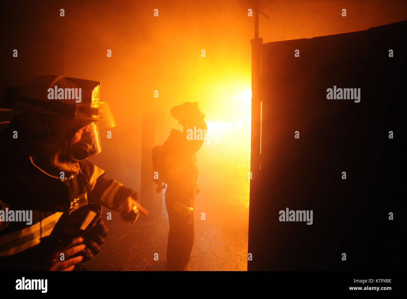 YAPHANK, New YorkMembers of the 106th Rescue Wing's Fire Department, hone their firefighting