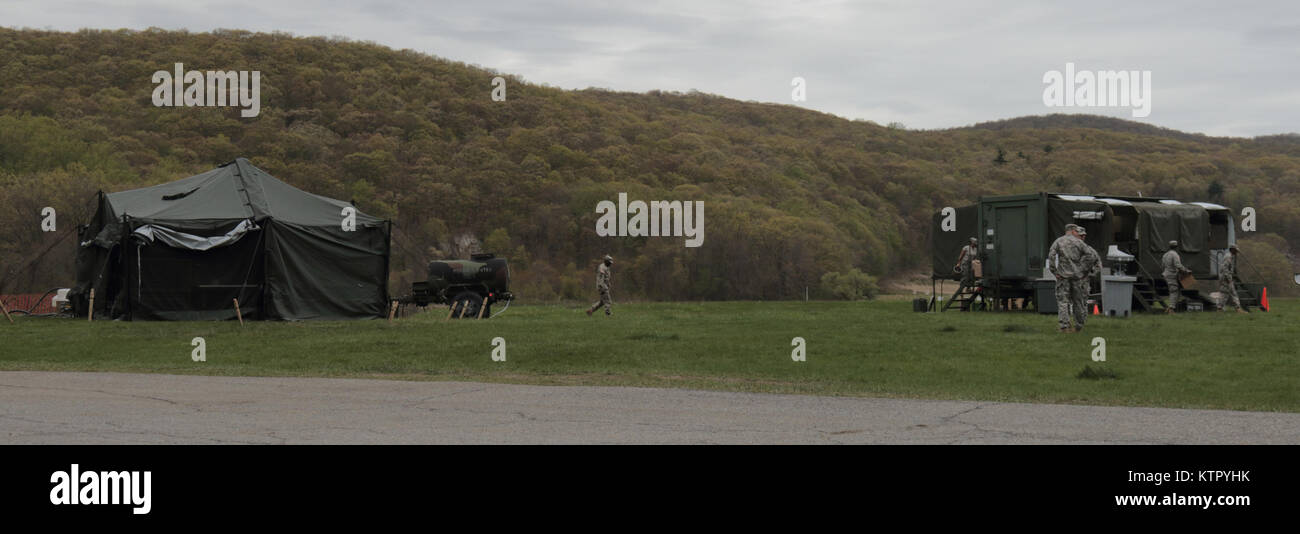 A New York Army National Guard Field Sanitation Tent (left) and a Field