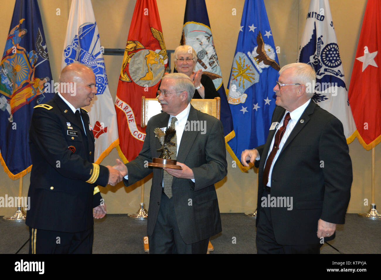 New York Army National Guard Commander Brig. Gen. Raymond Shields and New York State Employer Support of the Guard and Reserve Chairman Maj. Gen. (Ret.) Dennis Lutz present the ESGR’s Spirit of ESGR Award to Paul Geiss (center), a volunteer from central New York during the ESGR 2016 Awards Banquet in Albany, Apr. 26.  The Spirit of ESGR Award is presented to a volunteer who exemplifies the program and who has displayed the highest level of volunteer service. (U.S. Army National Guard photo by: Sgt. Major Corine Lombardo/RELEASED) Stock Photo