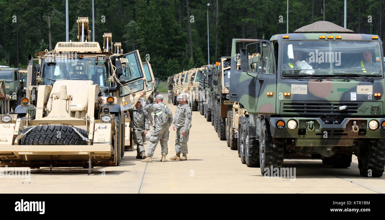 Armored vehicles line up and patiently wait to have the Multiple Integrated Laser Engagement System installed on their vehicles.   More than 3,000 New York Army National Guard Soldiers deployed to Fort Polk, Louisiana for a three week exercise at the Army’s Joint Readiness Training Center, July 9-30, 2016. Stock Photo