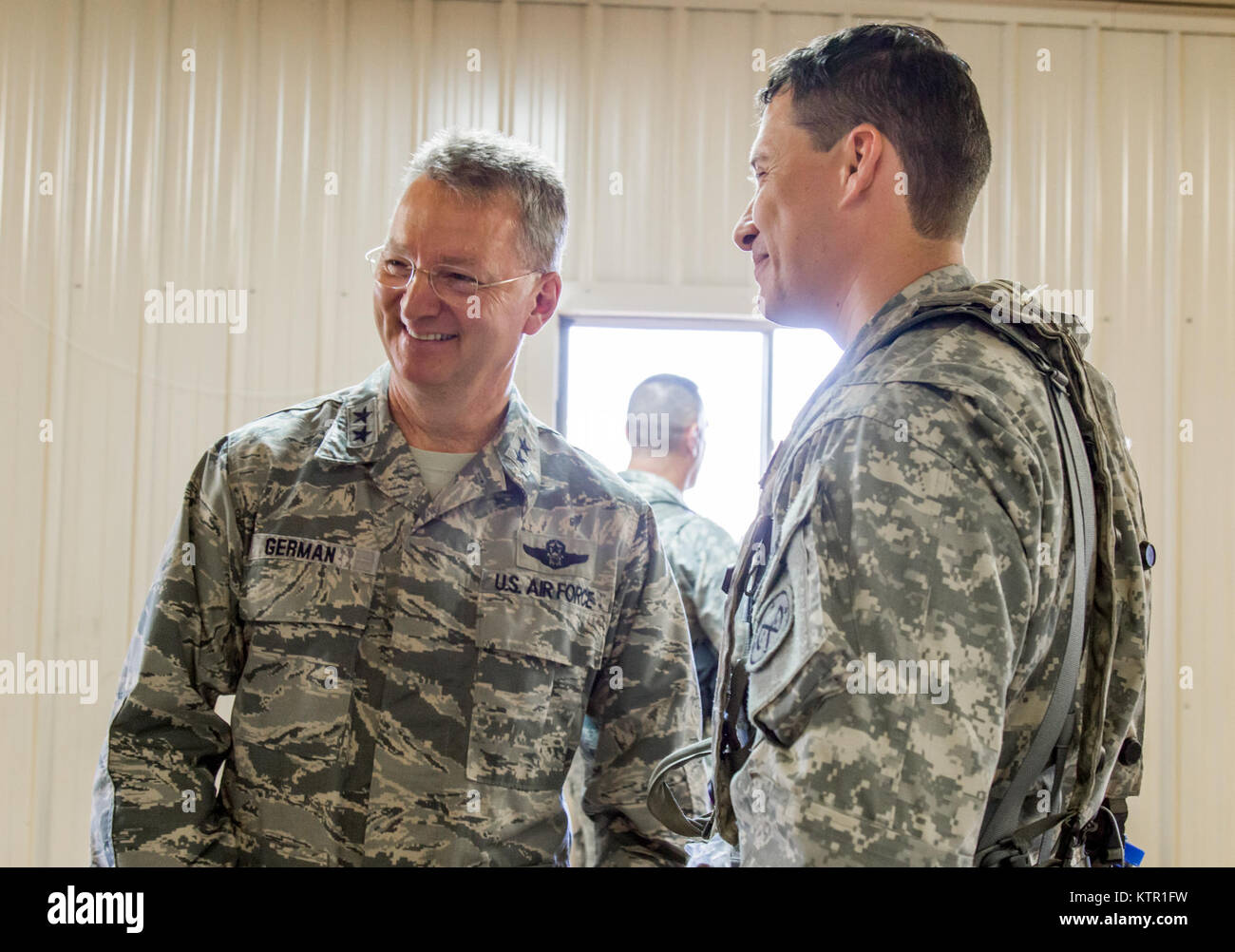 New York Air National Guard Maj. Gen. Anthony P. German, the Adjutant General of New York, chats with an officer following a mission brief at the Army’s Joint Rotational Training Center, Ft. Polk, La., July 16, 2016.   More than 3,000 New York Army National Guard Soldiers deployed to Fort Polk, Louisiana for a three-week exercise at the Army’s Joint Readiness Training Center, July 9-30, 2016. (U.S. Army National Guard photo by Sgt. Michael Davis) Stock Photo