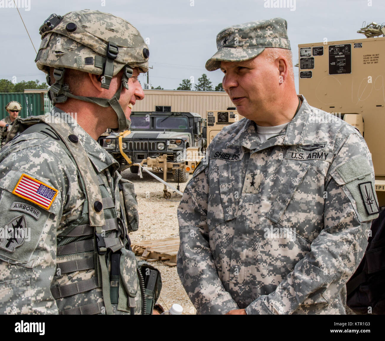 New York Army National Guard Brig. Gen. Raymond Shields, the New York National Guard’s director of joint staff, chats with a Soldier at the Army’s Joint Rotational Training Center, Ft. Polk, La., July 16, 2016.   More than 3,000 New York Army National Guard Soldiers deployed to Fort Polk, Louisiana for a three-week exercise at the Army’s Joint Readiness Training Center, July 9-30, 2016. (U.S. Army National Guard photo by Sgt. Michael Davis) Stock Photo