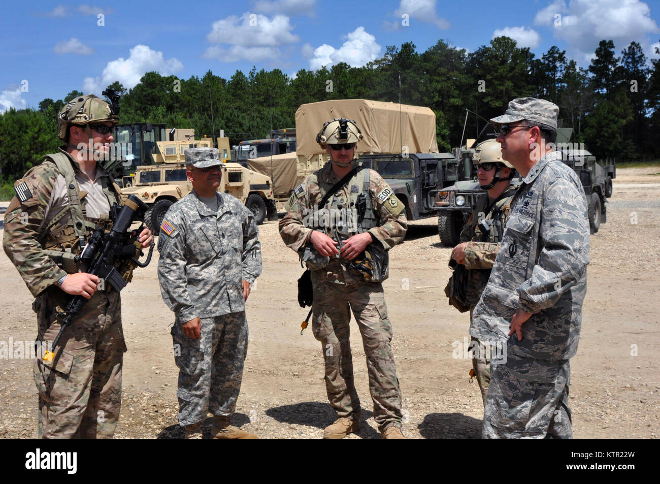 Massachusetts Air National Guard Maj. Gen. Gary Keefe, the Massachusetts National Guard Adjutant General and Command Sgt. Major Carlos Ramos Rivera State Command Sgt. Major and senior enlisted advisor, visit Soldiers to discuss their training at the Army’s Joint Readiness Training Center, Fort Polk, Louisiana, Wednesday, July 20, 2016. Nearly 700 Soldiers from the Massachusetts Army National Guard joined over 3,000 Soldiers of New York’s 27th Infantry Brigade Combat Team and another 1,000 Soldiers from other state Army National Guard units, active Army and Army Reserve troops at the Joint Read Stock Photo