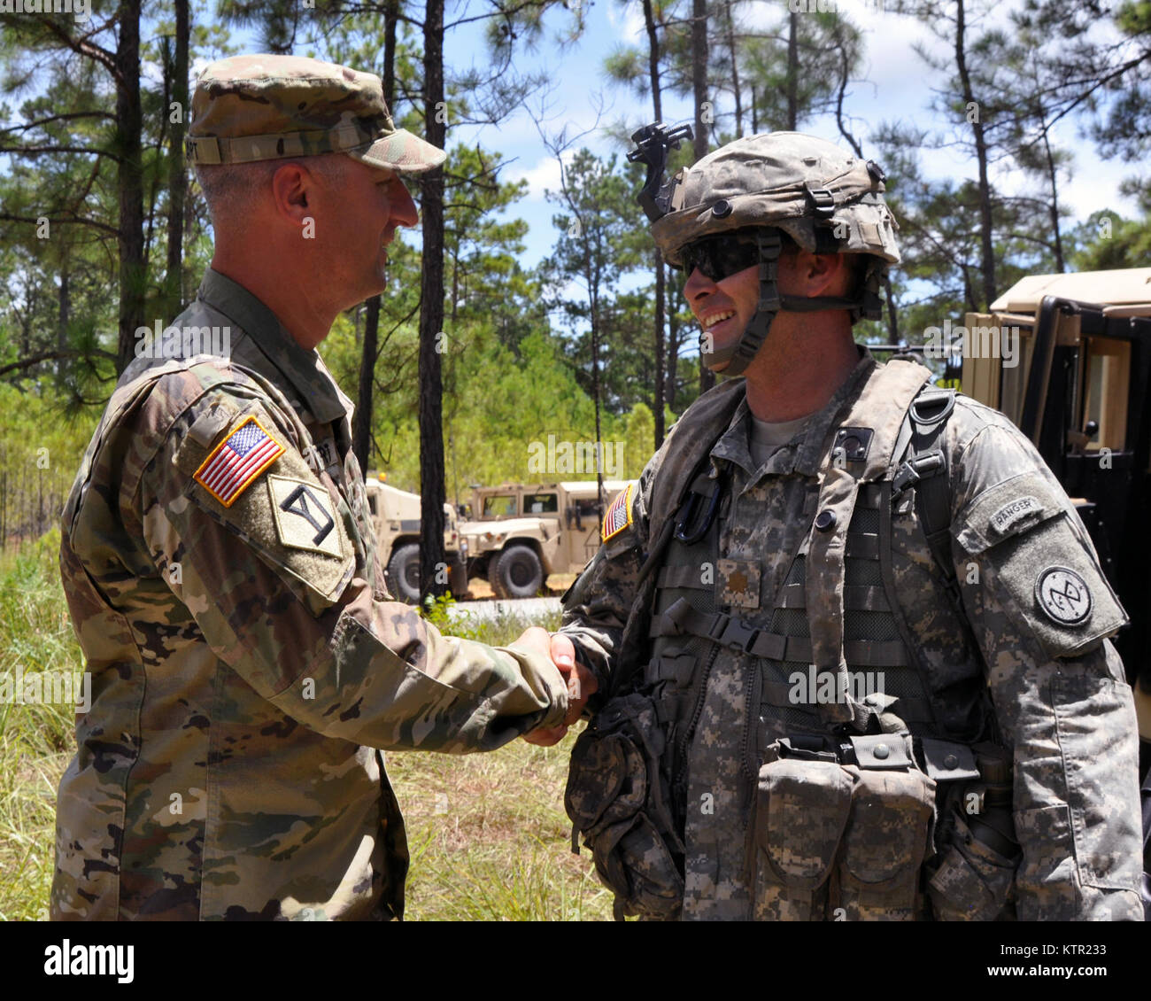 Massachusetts Army National Guard Col. Thomas Stewart, the Massachusetts National Guard Deputy Chief of Staff (left) and Lt. Col. Kenneth Wisniewski, commander of the 1st Battalion, 182nd Infantry based in Melrose, Mass., discuss training at the Army’s Joint Readiness Training Center, Fort Polk, Louisiana, Wednesday, July 20, 2016. Nearly 700 Soldiers from the Massachusetts Army National Guard joined over 3,000 Soldiers of New York’s 27th Infantry Brigade Combat Team and another 1,000 Soldiers from other state Army National Guard units, active Army and Army Reserve troops at the Joint Readines Stock Photo