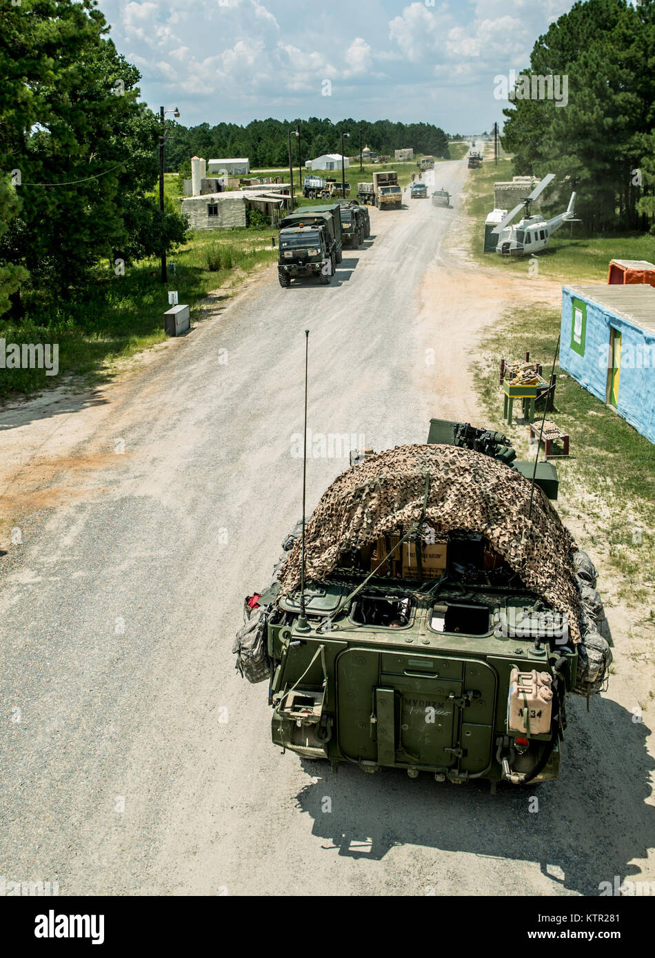 Pennsylvania Army National Guard Soldiers with Co. A, 1st Battalion, 112th Infantry defend the fictional town of Turani at the Joint Readiness Training Center, Ft. Polk, La., July 22, 2016.  The Pennsylvania Guardsmen joined over 5,000 Soldiers from other state Army National Guard units, active Army and Army Reserve troops as part of the 27th Infantry Brigade Combat Team task force.  The Soldiers are honing their skills and practicing integrating combat operations ranging from infantry troops engaging in close combat with an enemy to artillery and air strikes, July 9-30, 2016. (U.S. Army Natio Stock Photo